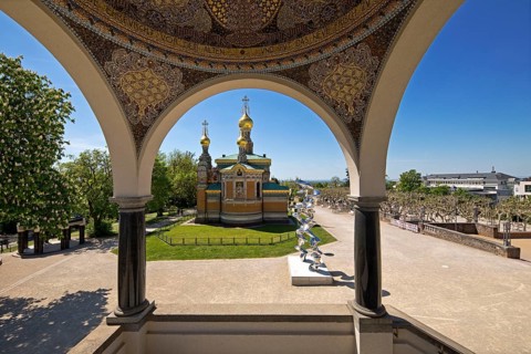 View from the pavilion to the Russian Chapel with the stainless steel sculpture by Tony Cragg,