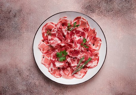 Sliced cured ham, prosciutto, italian dish, delicacy, parma ham, top view, no people