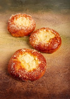 Bun with cottage cheese, pastries, cheesecake, no people