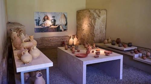 ©Udo Rein, Ancient ceramics exhibition in a museum with stone walls, storage objects, Casa Romana,