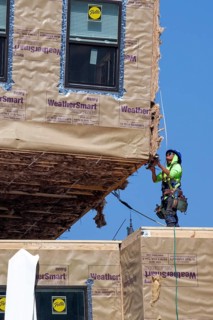 Detroit, Michigan - Workers use modular construction methods to build apartments for low to