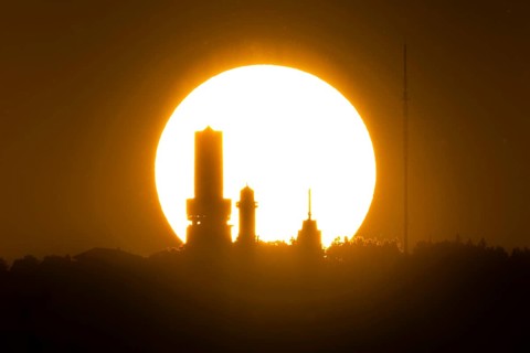 The sun sets behind the towers on the summit of the Großer Feldberg in the Taunus, Großer Feldberg
