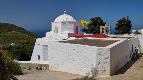 Whitewashed chapel with a view of the sea and surrounding green landscape, church, Chora, World