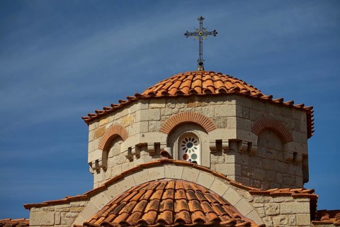 Church dome with cross in front of a clear blue sky, woman's monastery, Evangelismou Monastery,