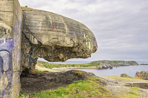 Old world war II bunker on the french coast which was part of the Atlantic wall a coastal defences