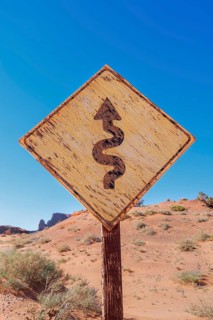 Zjgzag road sign, Monument Valley, Arizona, USA