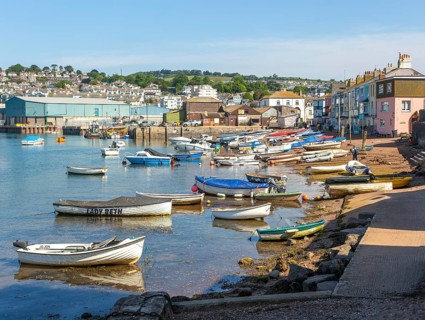 Small boats in harbour at Back Beach, Teignmouth, south Devon, England, UK