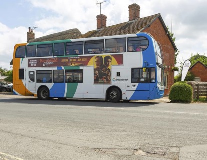 Stagecoach double decker Scania Enviro400 bus at bus stop, village of Avebury, Wiltshire, England,
