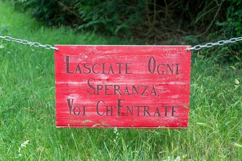 Lasciate Ogni Speranza Voi Ch'Entrate sign on chain, Suffolk, England, UK - abandon all hope, ye