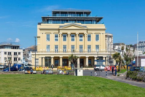 Riviera Apartments building former cinema, Den Crescent, Teignmouth, south Devon, England, UK