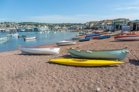 Small boats in harbour at Back Beach, Teignmouth, south Devon, England, UK