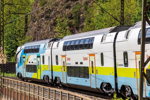Train of the Austrian Westbahn en route on the winding railway line of the Geislinger Steige.