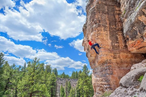 Man rock climbing at The Pit in Sandy's Canyon, Flagstaff, Arizona, USA