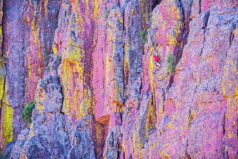 Man climbing canyon wall, Tonto National Forest, Arizona, USA, North America