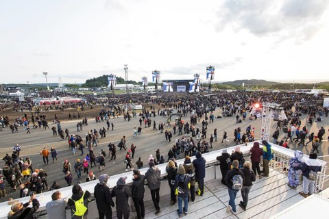 Festival-goers look at the Mandora Stage in the evening sun at the Rock am Ring Festival on Sunday,