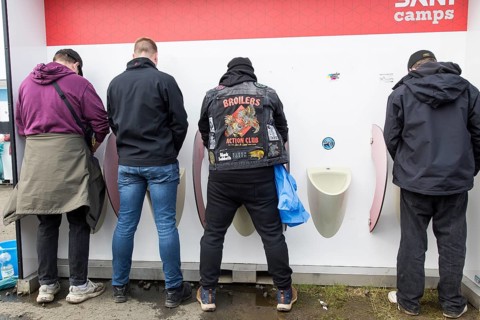 Four gentlemen at Pissiors at the Rock am Ring Festival on Friday, Nürburgring race track race