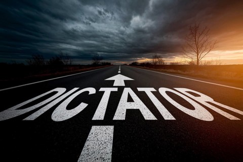 Road with white word 'Dictator' and arrow written on it with storm in background. Generative AI, AI