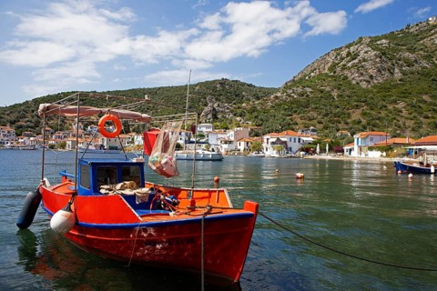 Red boat in the harbour of Agia Kiriaki on the Aegean Sea, Pelion or Pelion Peninsula, Magnisia,