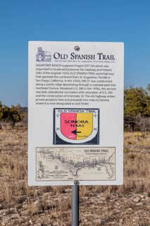 Sign indicating the location of the historical Old Spanish Trail auto trail across the United