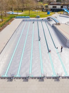 Bird's eye view of the swimming pool in a green area, renovation of the swimming lines, Calw