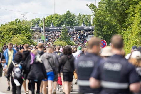 Festival visitors on their way to the main entrance at the Rock am Ring Festival on Friday,