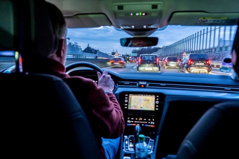 Driving on the A40 motorway, Ruhrschnellweg, in heavy traffic, drivers' perspective, Essen, North