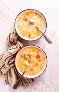 Finnish fish soup, lohikeito soup, creamy fish soup, two bowls of soup