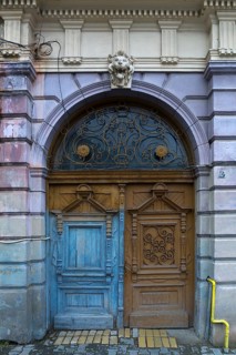 Wooden entrance portal with a 19th century residential building, Medias, Romania