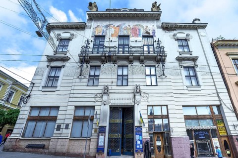 House façade with coloured frescoes, residential building around 1900, Czernowicz, Ukraine