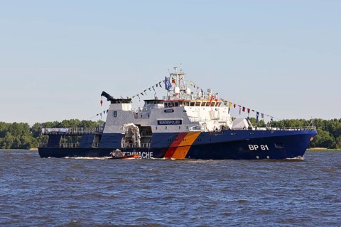 Decorated ship of the German Coast Guard and Federal Police BP 81 Potsdam leaves the Port of