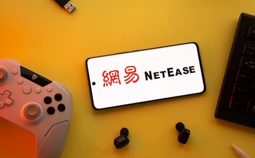 Dhaka, Bangladesh- 23 March 2025: NetEase logo displayed on a smartphone surrounded by gaming