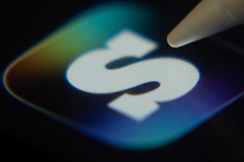 Dhaka, Bangladesh- 06 Dec 2025: Close-up of the SCRUFF app on a screen with a stylus pointing at it