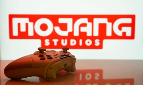 Dhaka, Bangladesh- 20 Mar 2025: A close-up of a white gamepad with the Mojang Studios seen on