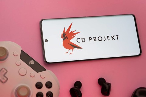 Dhaka, Bangladesh- 08 Apr 2025: A smartphone displaying the CD Projekt logo next to a gaming