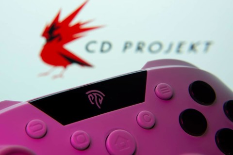 Dhaka, Bangladesh- 24 Mar 2025: A close-up of a gamepad with the CD Projekt seen on screen in the