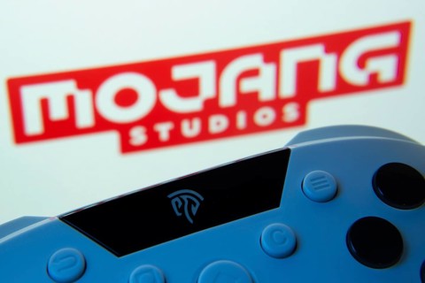 Dhaka, Bangladesh- 24 Mar 2025: A close-up of a gamepad with the Mojang Studios seen on screen in