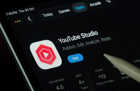 Dhaka, Bangladesh- 30 Oct 2025: Youtube Studio app displayed on a iPad screen in dark mode with a