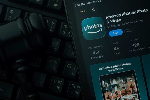 Dhaka, Bangladesh- 28 Oct 2025: An iPad displaying the Amazon photos app against a judge's gavel
