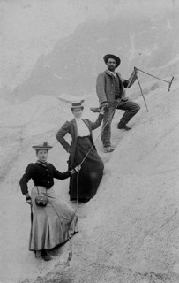 Mountaineering, rope protection, two woman and a man climbing in the Alps, around 1910, high