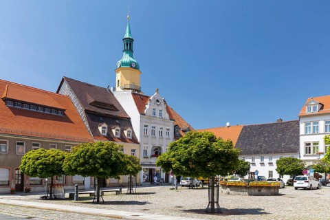 Medieval market square with market fountain and St. Nicolai town church, Pulsnitz, Saxony, Germany