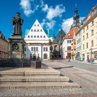 The market square of Eisleben with the monument to Martin Luther, Luther monument, bronze sculpture