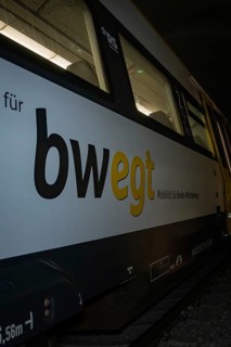 Close-up of a train with 'bwegt' inscription in a tunnel, fire department exercise on the Hermann