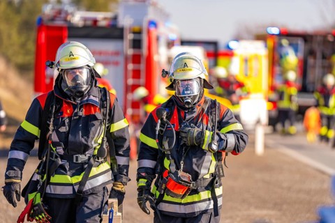Firefighters during an emergency operation with full protective clothing and respiratory