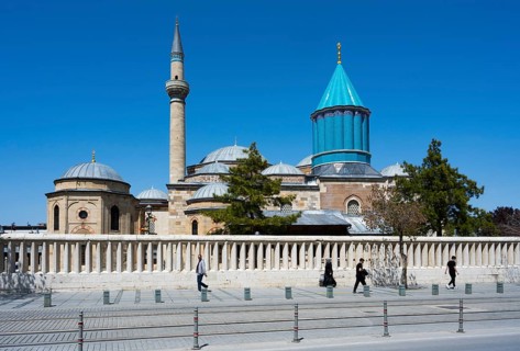 Grand mosque with minaret and religious architecture under clear skies, Mevlana Museum, Mevlana,