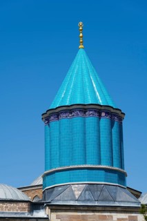 Detail of a turquoise dome in Islamic architecture under a blue sky, Mevlana Museum, Mevlana,