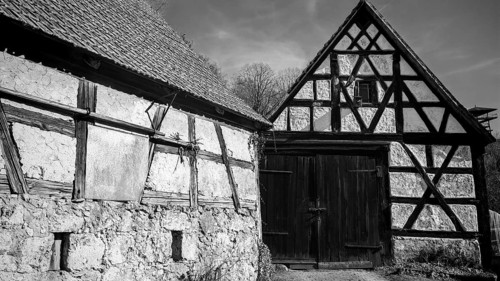 Old half-timbered buildings shot in black and white, Franconian Switzerland
