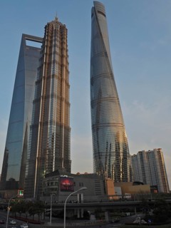 Two impressive modern skyscrapers, Shanghai Tower, at sunset, Shanghai, China