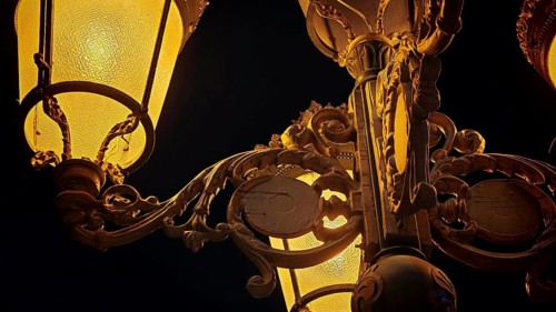 Close-up of an artfully designed lantern with golden lighting at night, Skopje, North Macedonia