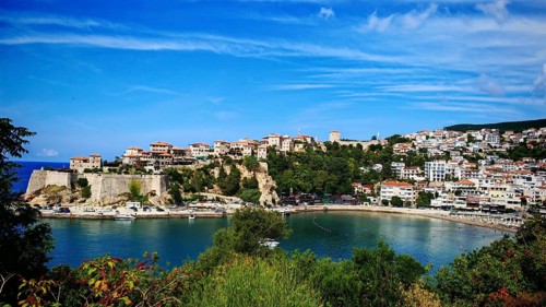 Panoramic view of coastal town with historic buildings and harbor, view of Ulcinj, Montenegro