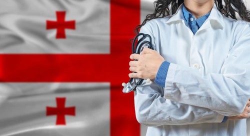 Healthcare professional with Georgia flag background. Professional doctor holding stethoscope on
